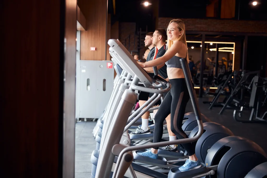 cheerful young woman using treadmill for her daily 2025 03 06 19 17 47 utc